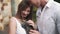 Close up slowmotion video of couple play with small little kitten.