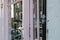 Close-up of a small high street shop showing its pink paintwork.