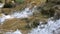 Close-up of Small Waterfall With Mossy Rocks, Zoom Out