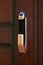 Close-up of a smart door lock with fingerprint area open