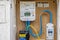 Close up of a smart electricity meter in wall mounted outside box in Chapmanslade, Wiltshire, UK