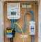 Close up of a smart electricity meter in wall mounted outside box in Chapmanslade, Wiltshire, UK