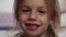 Close-up smile of girl. A beautiful little girl 6-7 years old has lost milk teeth. Loss of milk teeth, replacement of