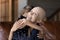 Close up smiling hairless woman cancer patient hugging little daughter