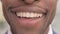 Close up of Smiling Mouth of African Businessman