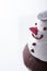 Close up of snowman cupcake on white background