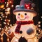 Close up snowman with lights and shining outdoor Christmas decorations at night.