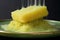 close-up of soapy sponge on a dish