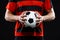 Close up of soccer ball in athlete\'s hands