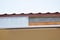 Close up on Soffit and Fascia Installation. New House Roofing Construction.