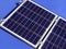 Close up solar panel on blue boat roof background.