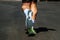 close-up sole running shoe and legs male runner