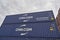 Close up of some Blue CMA CGM Eco Shipping Containers stacked up in Den Haag .