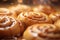 a close up of some cinnamon buns on a table