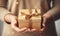 close up of someone holding a gift box tied with a bow