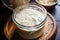 close-up of sourdough starter in a glass jar