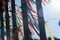 Close-up of souvenir ribbons attached to the railings of the water fountain at Largo Terreiro de Jesus in Pelourinho, city of