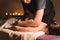 Close-up Spa massage low angle. male massage therapist doing a back and shoulder massage to a young girl with her elbows