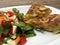 Close-up of spanish tortilla with salad