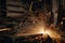 A close-up of sparks flying from welding equipment in a factory workshop