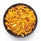 Close-Up of Spicy Chatpata Mixture in a black Ceramic bowl made with peanuts, corn flakes. Indian spicy snacks Namkeen