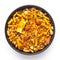 Close up of spicy Ratlami mixture Indian namkeen snacks on a ceramic black bowl.
