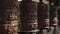 A close-up of a spinning buddhist prayer wheel in a row of wheels in Nepal Kathmandu