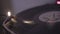 Close-up spinning vinyl plate, deejay playing record nightclub