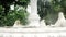 Close up of splashing fountain in three levels in the garden which decorated in front of the building.