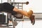 Close up of sport man stretching and lifting weight by two legs when facing down for stretching muscle at fitness gym at