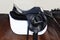 Close up of a sport saddle on equestrian event