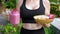 Close-up of Sport Woman with Healthy Diet Fruit Smoothie Bowl with Oatmeal