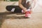 close up sport woman tying shoelace