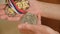 Close-up of sports medals. Stock footage. Elderly woman holds old medals. Medals of chess champion. Medals with chess