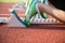 Close-up of sprinter feet in starting block