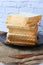 close up of stack of baked bread on table