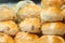 close up of stack of baked bread on table