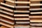 Close up of a stack from Folded wood party tables and benches