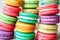 Close-up of a stack of macaroons in pastel colors.