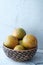 Close up of stack of orange in a bowl