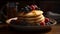 Close-up of Stack Pancakes With Berries and Syrup