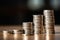 Close-up of a stack of silver coins on a soft background with copy space for business. AI generated