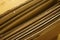 Close-up of stacked corrugated cardboard. Sheets of brown corrugated cardboard