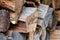 Close Up of Stacked Wooden Logs Background