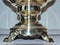 Close-up stand for the samovar podduvalo. A samovar of this traditional form is called a `Bank`. Traditional Russian tea party.