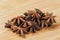 Close up of Star Anise Spices isolated on wooden background