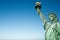 Close up of the Statue of Liberty in New York, USA. Blue sky background