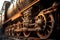 close-up of steam train wheels in motion