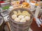 Close up Steamed Baozi or bun and dumpling the famous chinese cuisine in Breakfast restaurant at zhangjiajie Downtown alley
