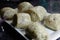 Close up of steamed taro bread on table